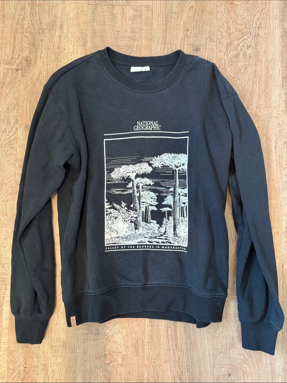 tentree Black Crewneck Sweatshirt with cream national geographic print